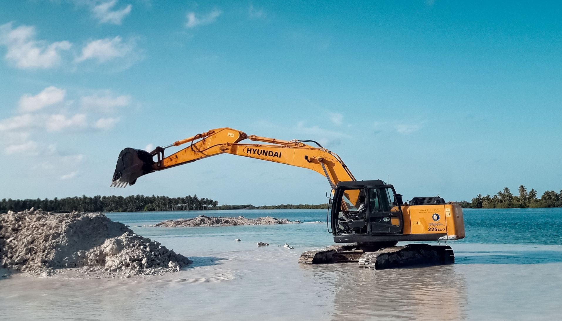 Digger on a beach